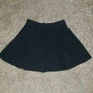 Black quilted skater skirt